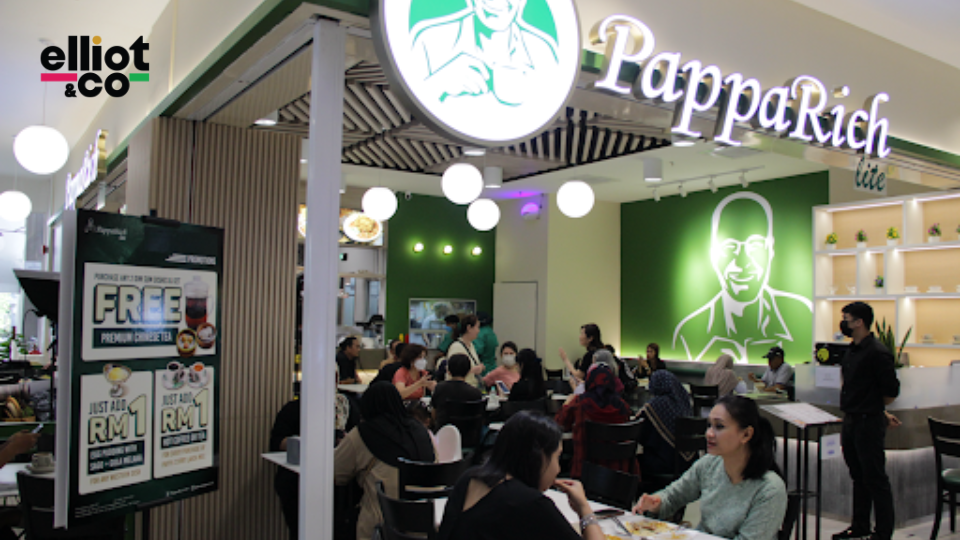PappaRich Lite restaurant interior with diners and refreshed green branding